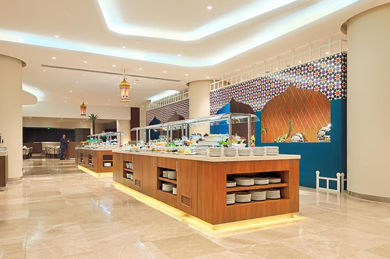 Holiday Suites Al Azizia Mekka Exterior foto The hotel's restaurant