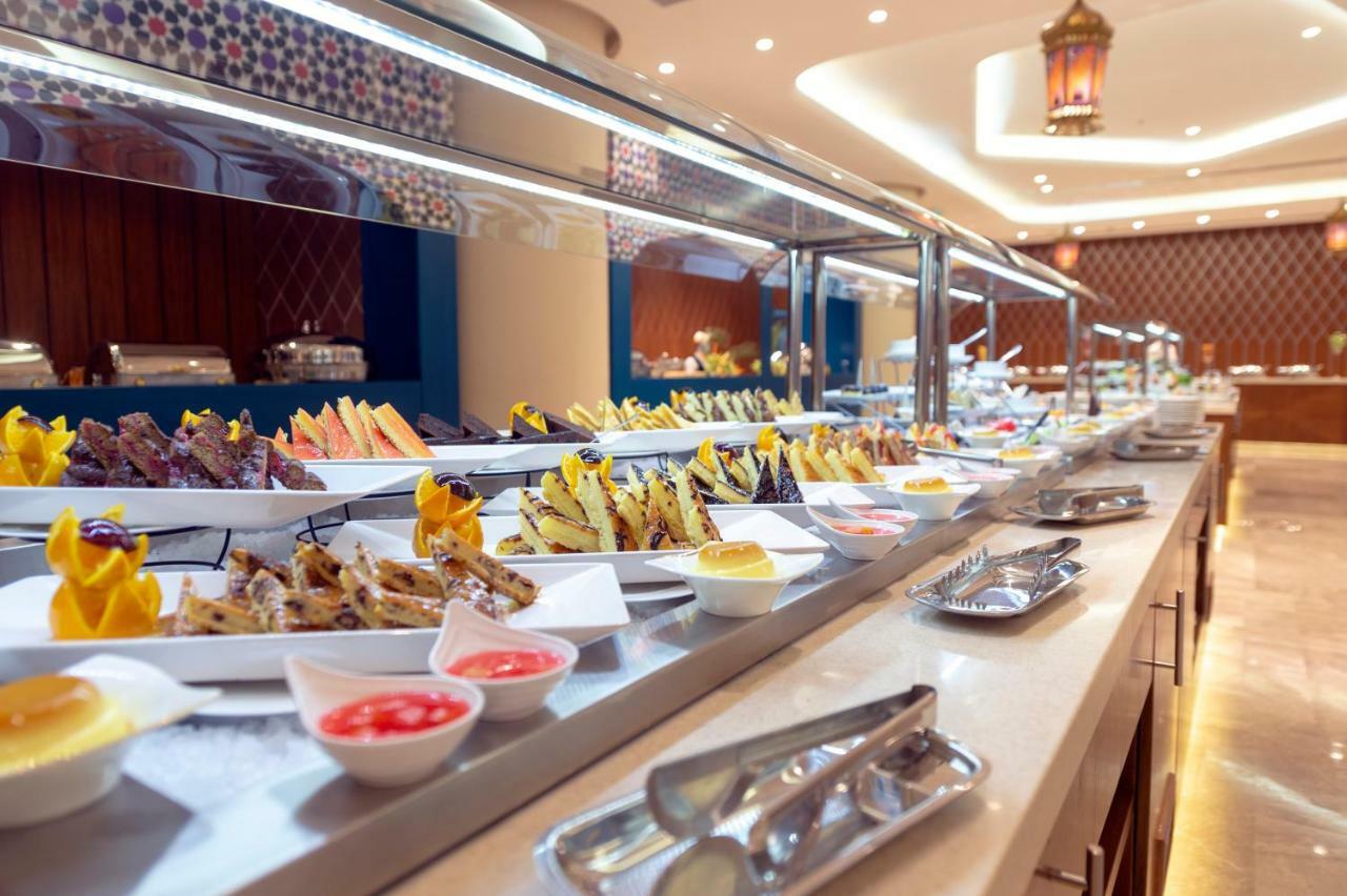 Holiday Suites Al Azizia Mekka Exterior foto Buffet at the hotel